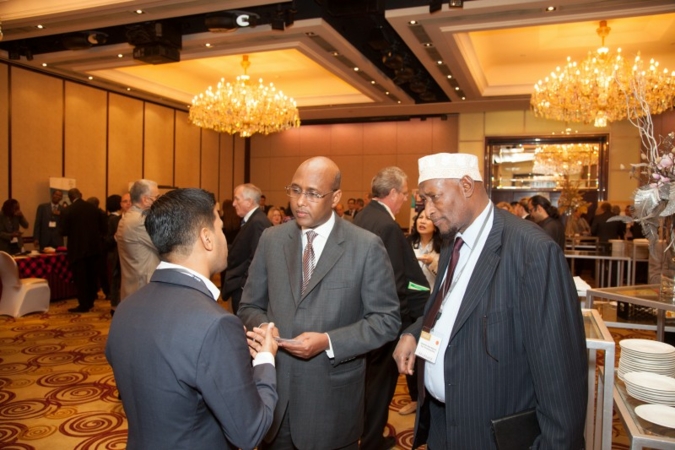 Hon Adan Mohamed in the middle chatting with delegates during the coffee break Photo: Vicky Sung