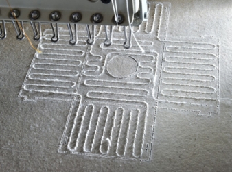 Stitched heating elements