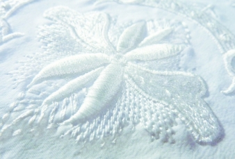 Plastic, tone on tone embroidery Photos: Madeira