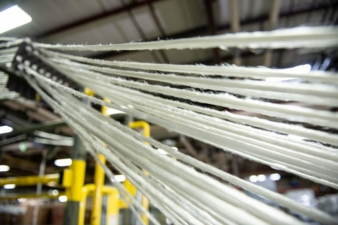 100% post-industrial recycled synthetic fibers with a non-skid
